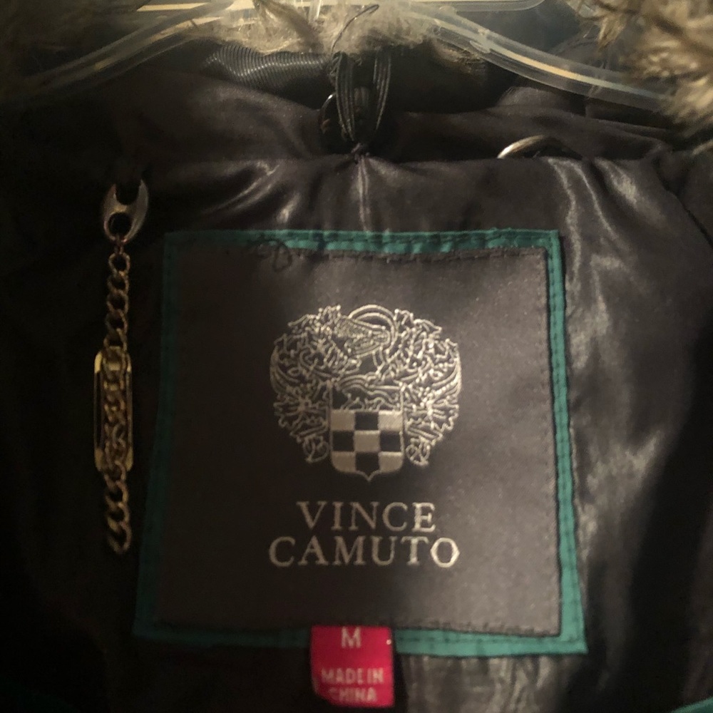 Knee length down jacket